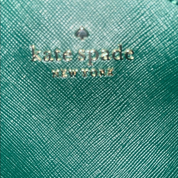 Kate Spade Schuyler mini backpack in the color Deep Jade green. - Picture 13 of 13